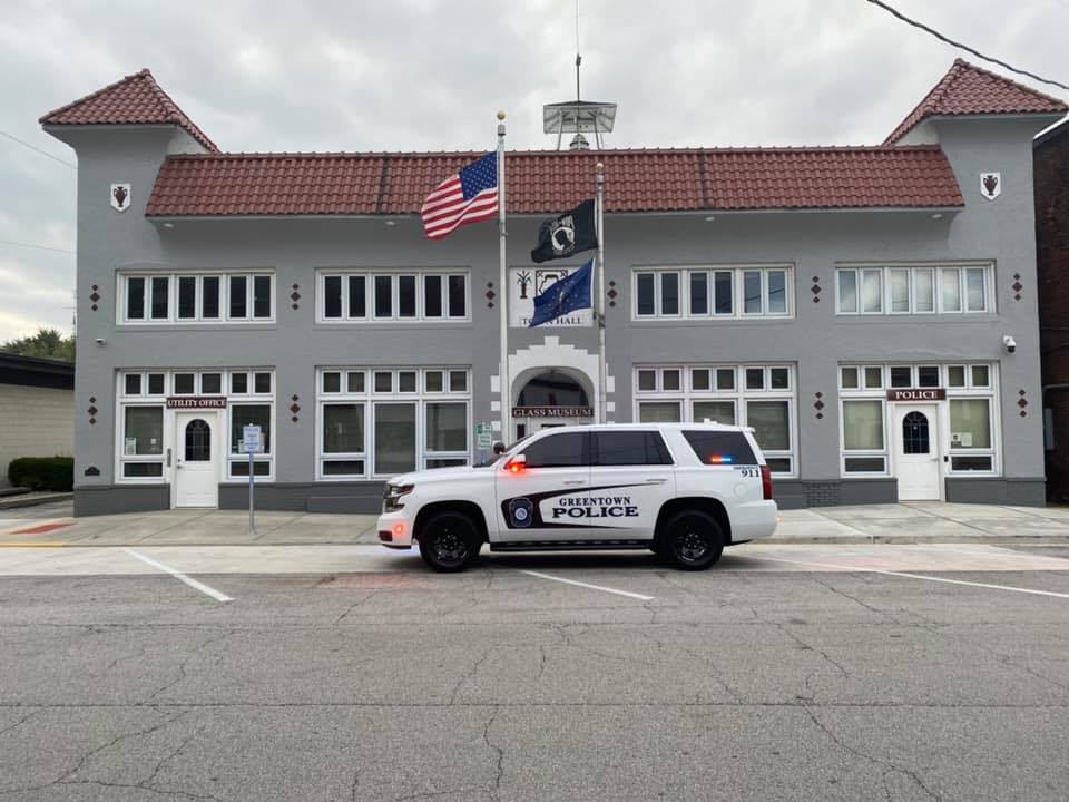 Greentown City Hall and a Greentown Police vehicle